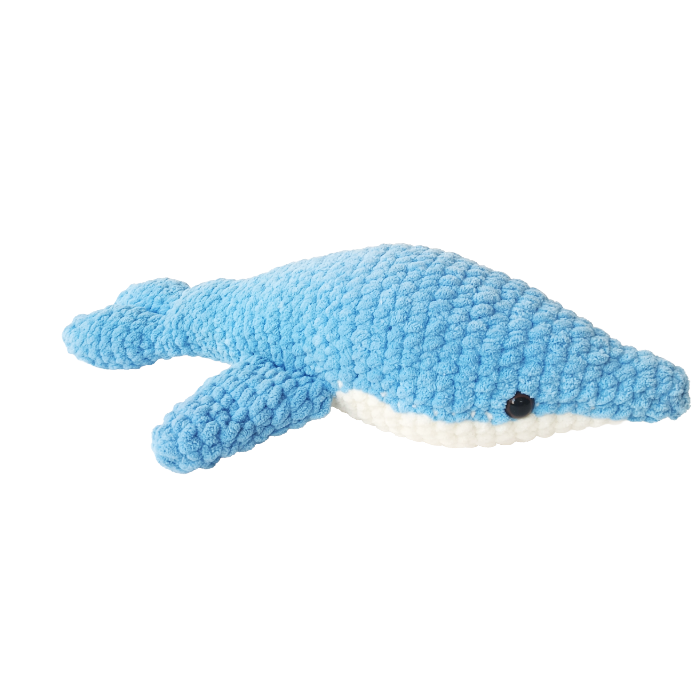 Blue whale-shaped plush toy on a white background
