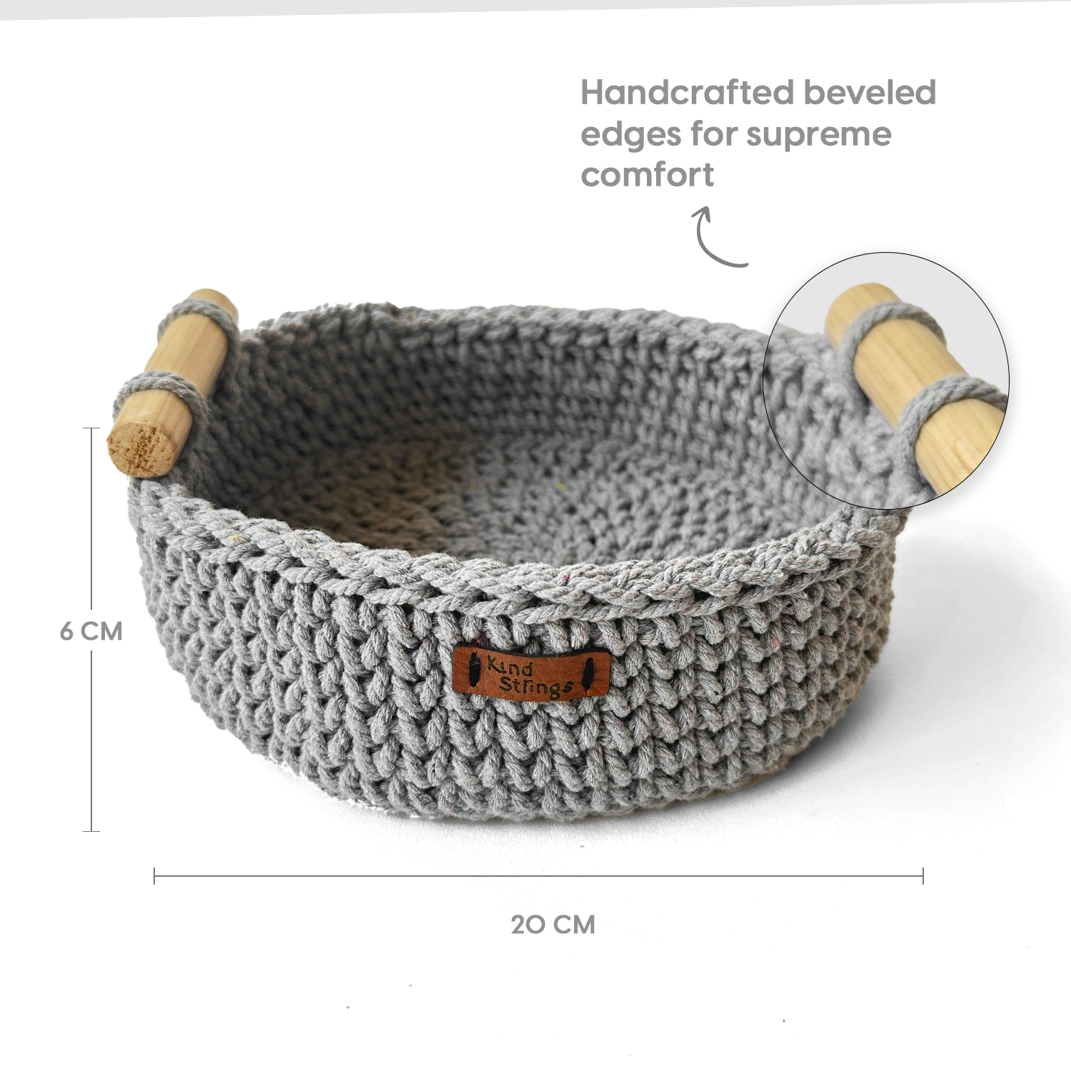 Gray knitted Basket with wooden edges on a white background