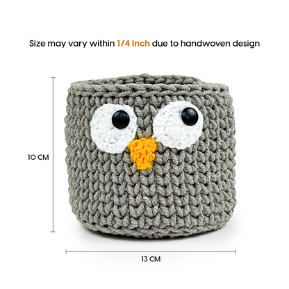 Gray knitted owl-shaped container with measurements on a white background