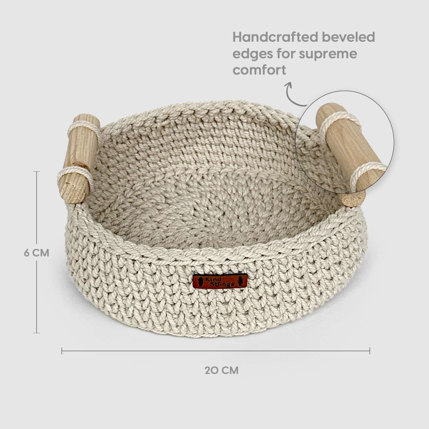 Handcrafted woven Basket with beveled edges on a light gray background