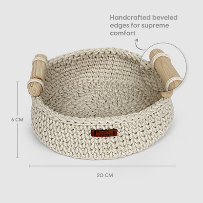 Handcrafted woven Basket with beveled edges on a light gray background
