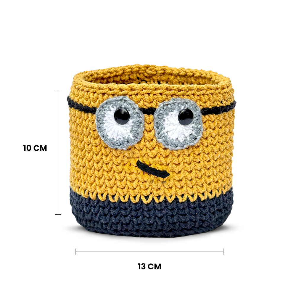 Knitted minion-style basket with measurements on a white background