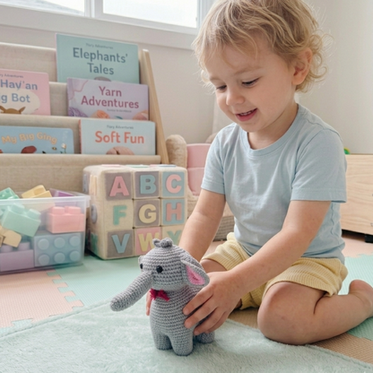 Child playing with a toy elephant in a room filled with books and toys.