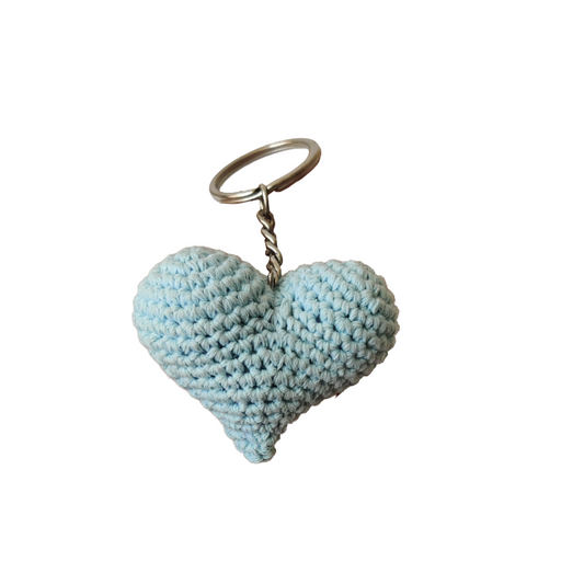 Light blue heart-shaped keychain on a white background