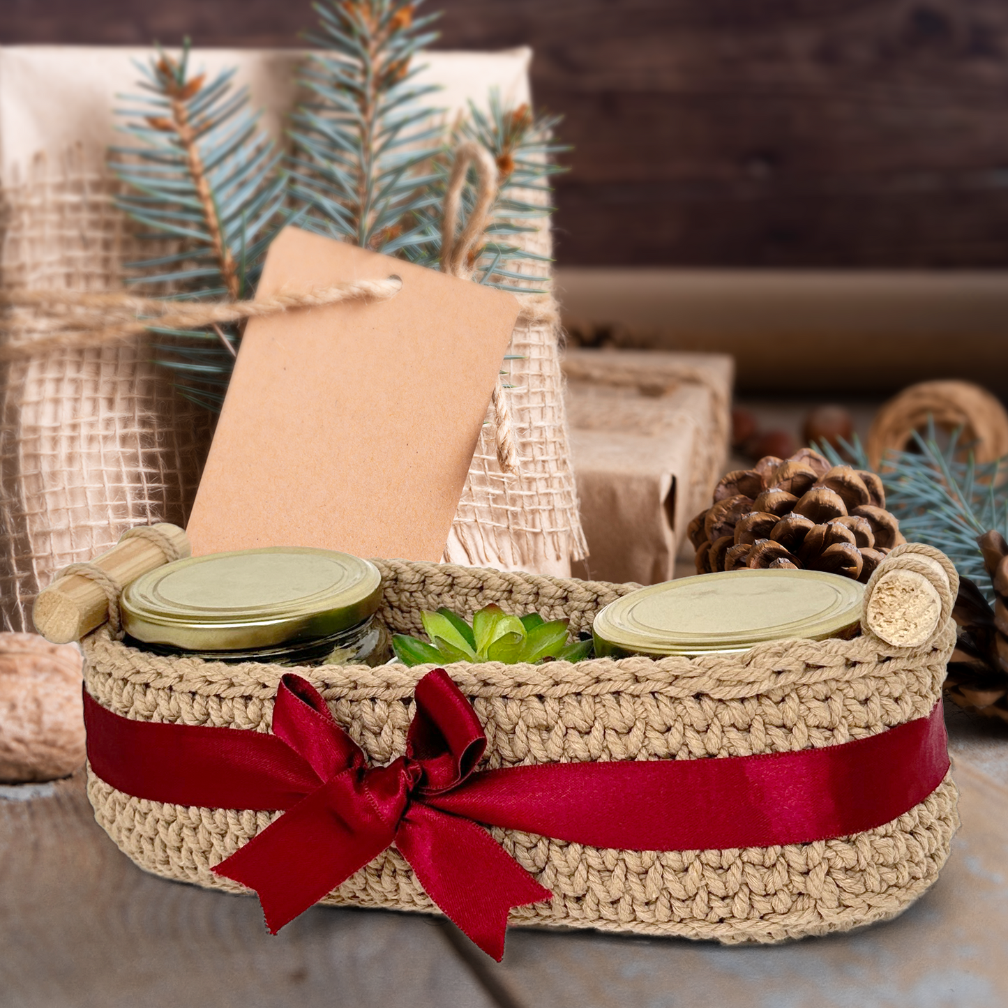 Woven basket with red ribbon, jars, and plants on a wooden surface.